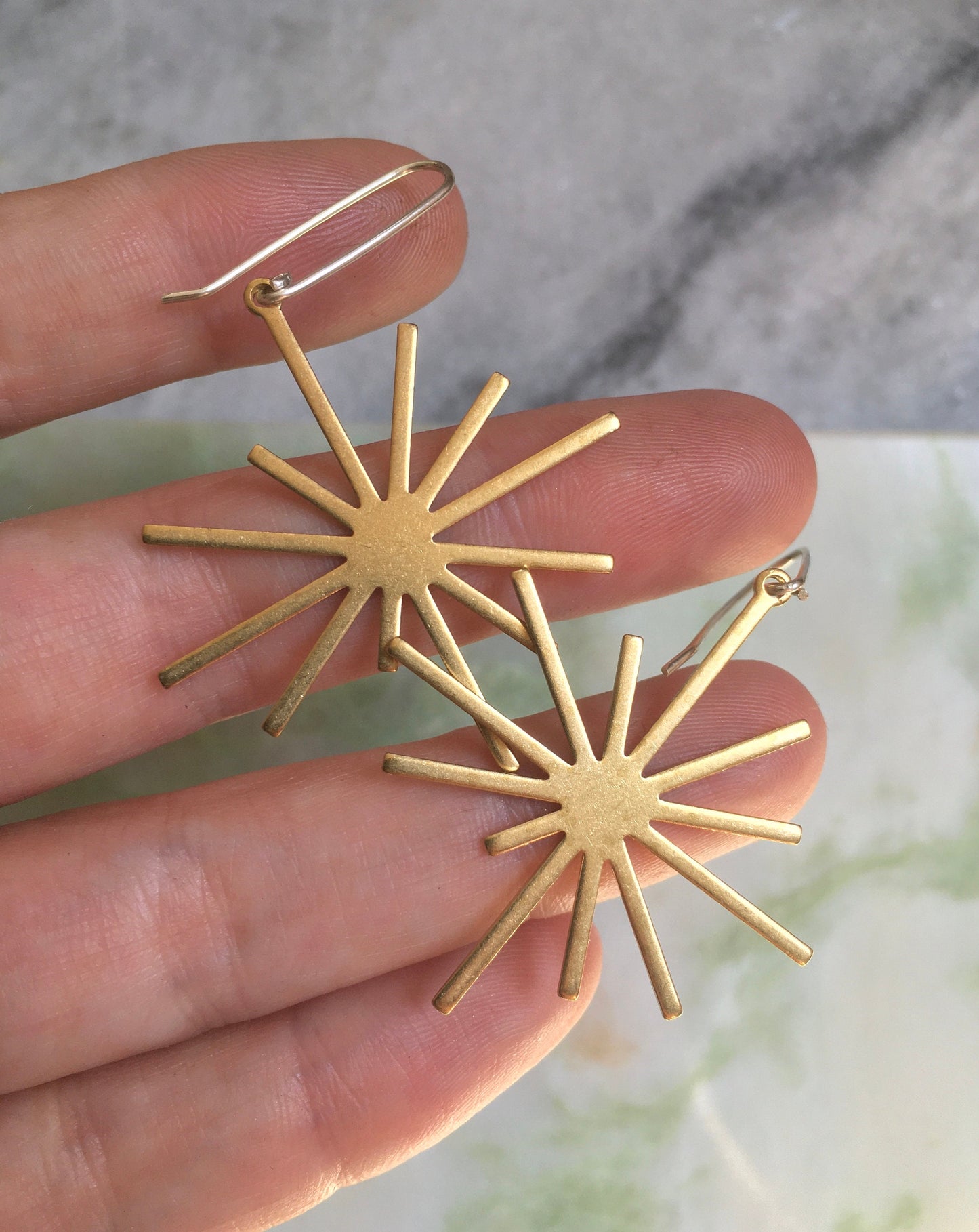 Brass starburst earrings