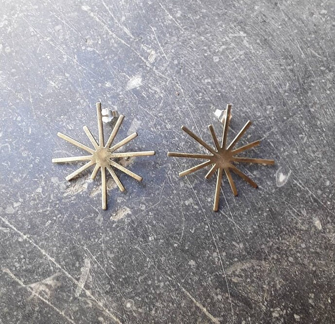 Brass starburst earrings