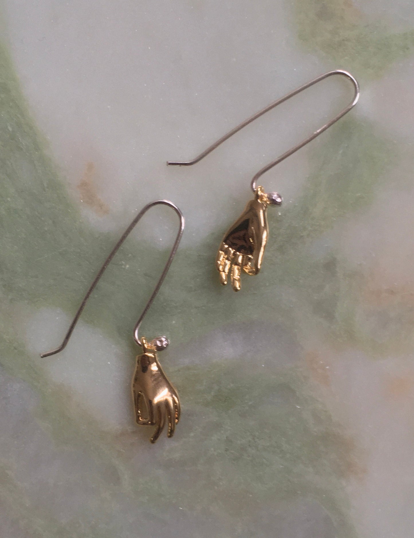 Helping hand earrings