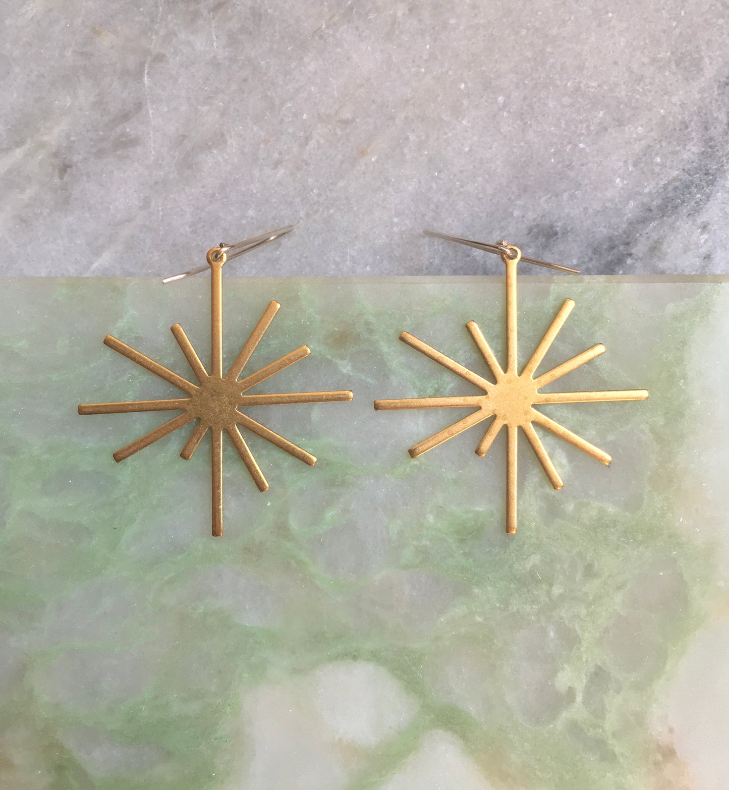 Brass starburst earrings