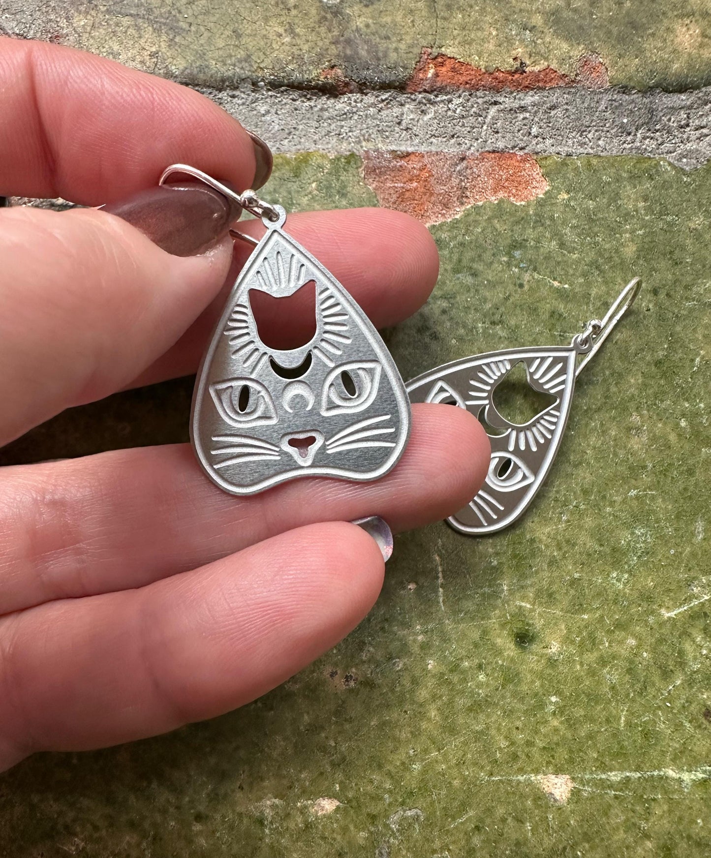 Cat pendant earrings