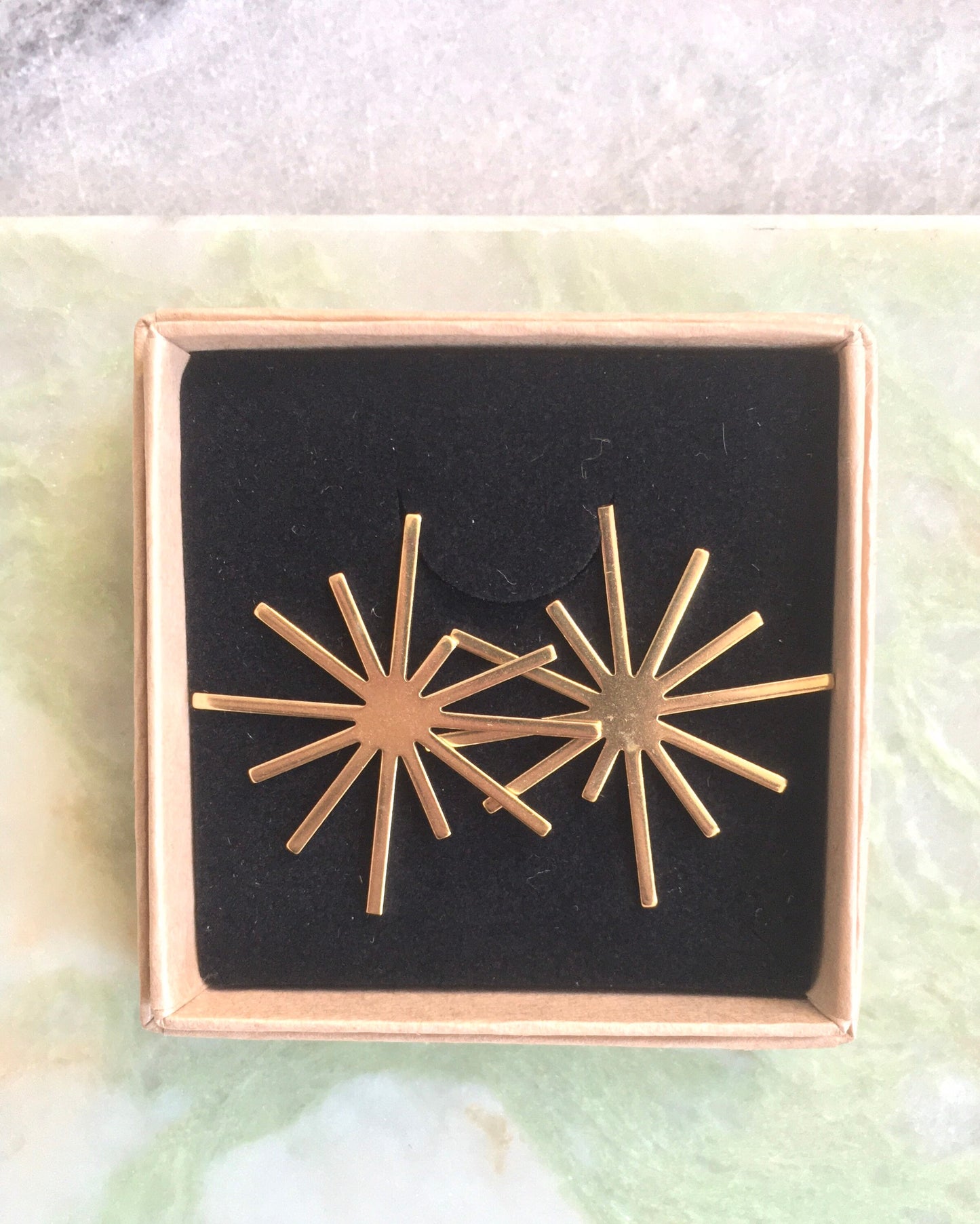 Brass starburst earrings